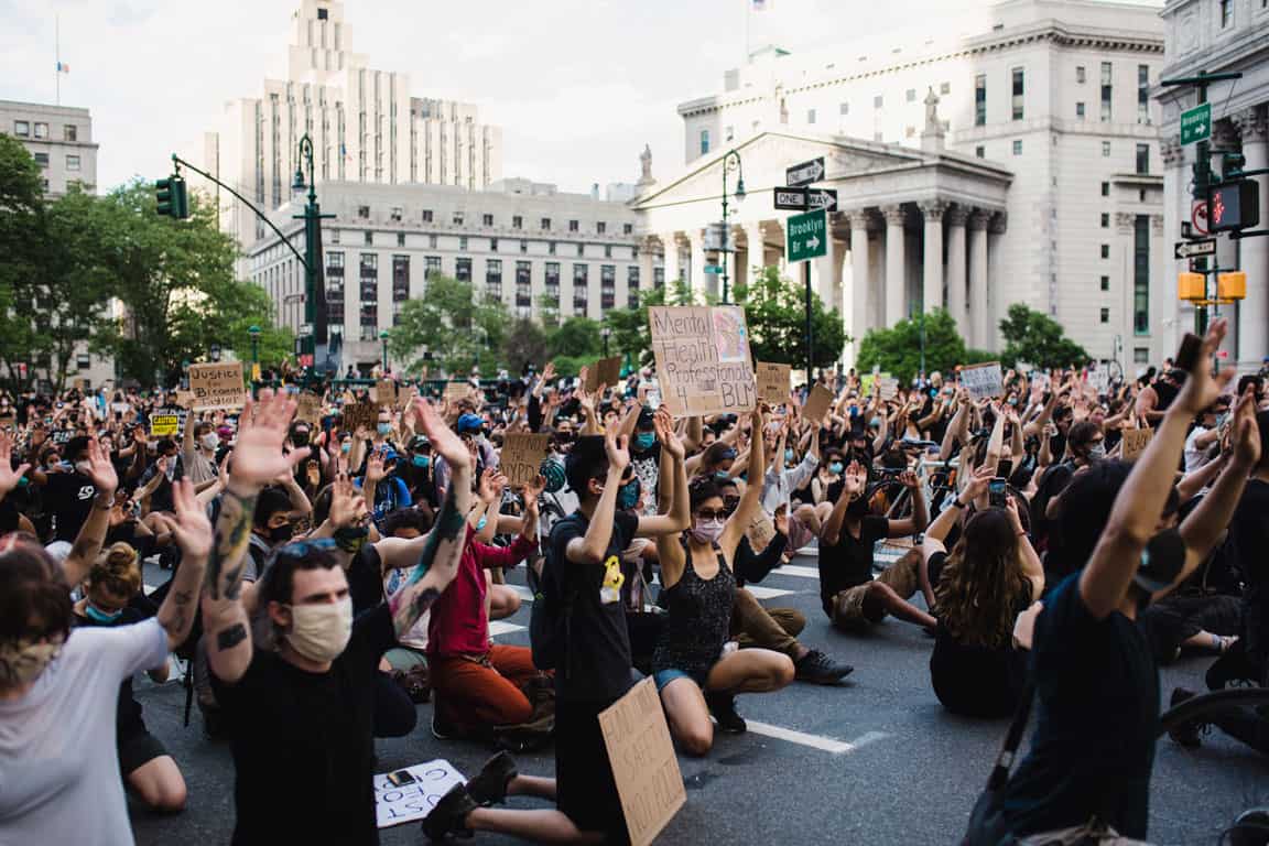 crowd-of-protesters-holding-signs-and-kneeling-june